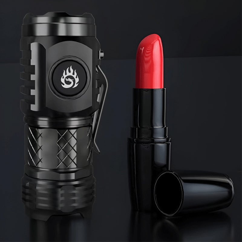 Mini linterna con monstruo de tres ojos